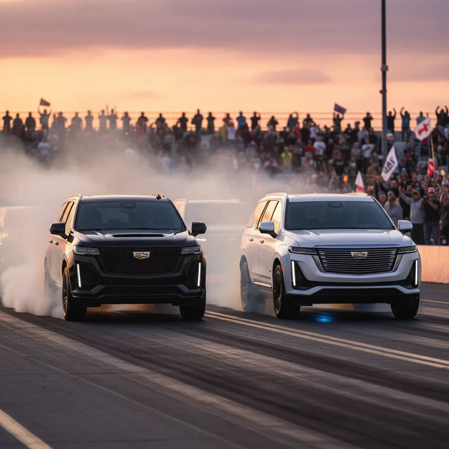 Editorial photo-realistic HERO image for automotive news (2026-02-15). Feature Cadillac vehicles specifically Escalade V, Escalade IQ. Scene: A dramat