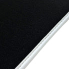 Black Floor Mats for Ferrari Purosangue with Leather and White Trim | Italian Edition - AutoWin