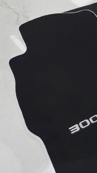 Alfombrillas negras para coches Nissan 300ZX (1990-2000) con ribete blanco